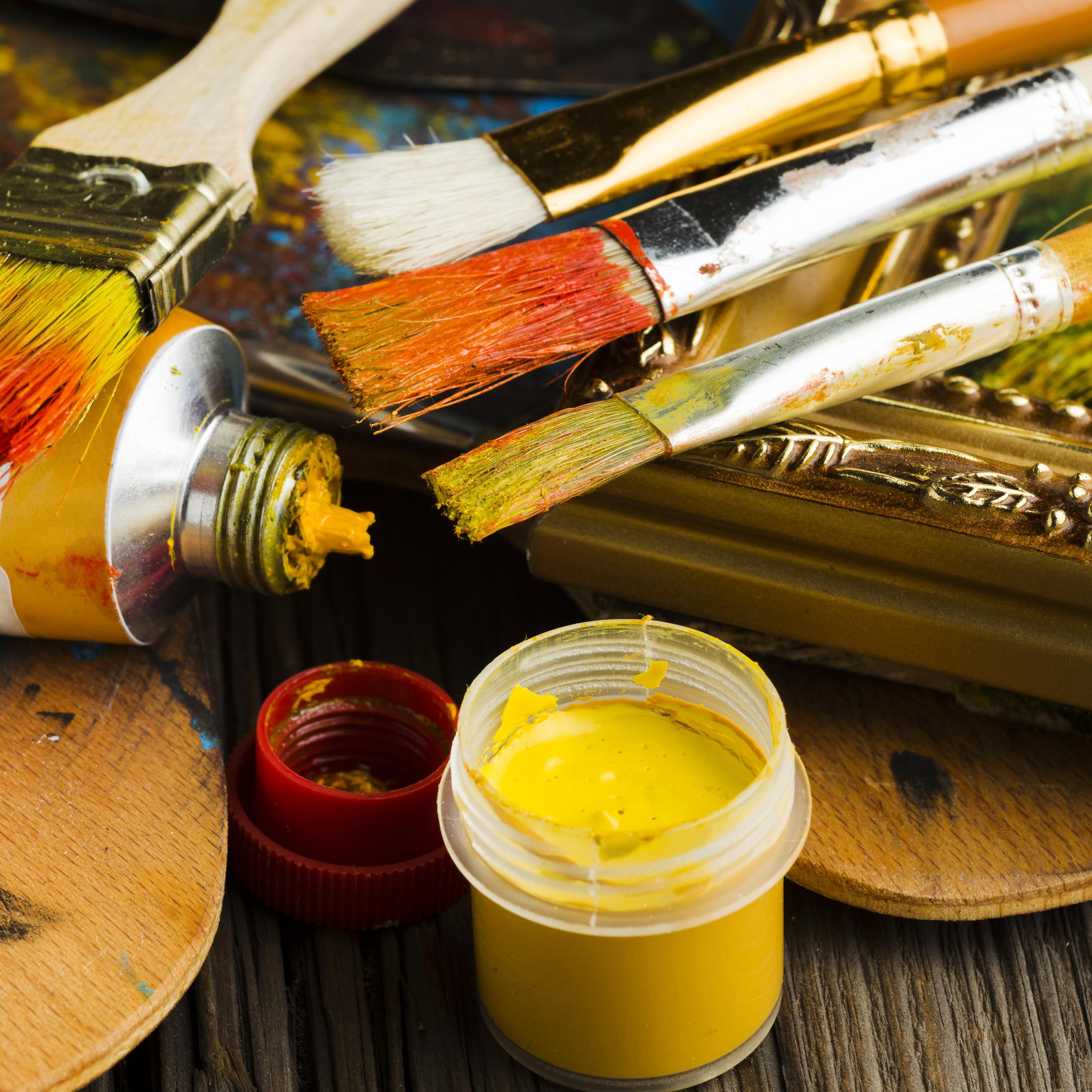 High view coloured paint brushes close up 1